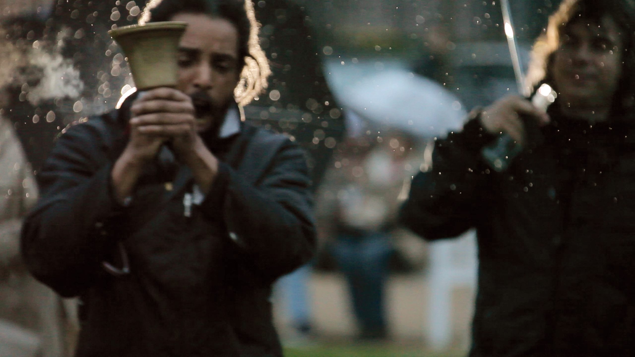 *Watering Hole,* 2013. Performance. Jean-Claude Mawila